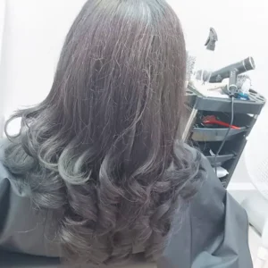Expert stylist cutting hair at Halo Beauty Salon Hayes